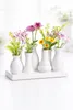 Handgefertigte kleine Keramik Deko Blumenvasen Set aus 7 Produktbild-Vorschau 3