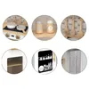 Collage of close-up images showing different features and accessories of a wooden toy kitchen. Produktbild-Vorschau