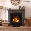 A fireplace with a fire burning inside, decorated with various home accessories. Náhľad obrázku produktu