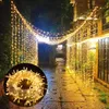 A pathway decorated with string lights at night. Náhled obrázku produktu