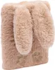 A fluffy, beige notebook with bunny ears and paw prints. Voir les images du produit