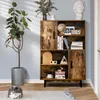 A bookshelf filled with books and decorative items, placed in a room with a plant and a cat. Podgląd zdjęcia produktu