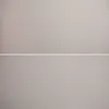 Two views of a gray beanbag chair, one plain and one showing its textured fabric. Produktbild-Vorschau