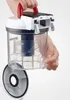 A hand holding a disassembled vacuum cleaner dustbin. Anteprima dell’immagine prodotto