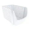 A white plastic storage bin with a perforated design and an open front. Anteprima dell’immagine prodotto