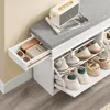 A shoe bench with storage compartments and a cushioned seat. Produktbild-Vorschau
