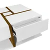A close-up view of a white coffee table with brown geometric accents and an open drawer. Náhľad obrázku produktu