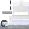 A white upholstered bed frame with a crown-shaped headboard and LED lighting, showing adjustable height and mattress thickness. Anteprima dell’immagine prodotto