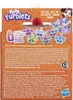 The back of a Hasbro Furby Furblets toy packaging, showing multiple small collectible figures and product information in various languages. Anteprima dell’immagine prodotto