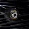 Close-up of a hose connector with a black outer casing and silver and gold metal fittings. Produktbild-Vorschau