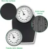 A mechanical scale with close-up views highlighting its features. Produktbild-Vorschau