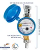 A water meter with a blue protective cap, showing measurement dials and connection fittings. Text annotations indicate dimensions and certifications. Produktbild-Vorschau