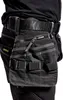 A close-up view of a person wearing a black tool belt with multiple pouches and loops, attached to black work pants. Produktbild-Vorschau
