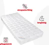 A white quilted mattress topper on a light gray and white background, with icons and text indicating product features. Produktbild-Vorschau