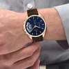 A person's wrist wearing a Tommy Hilfiger watch. Produktbild-Vorschau
