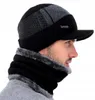 A man wearing a winter hat and scarf. Produktbild-Vorschau