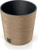 A close-up studio shot of a round, low planter pot with a textured, wood-like finish and a black interior. Náhled obrázku produktu