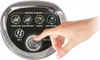 A hand is pressing the start button on a kitchen appliance control panel. Produktbild-Vorschau