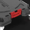 A close-up view of a red plastic latch mechanism connecting two parts of a gray modular transport system. Náhled obrázku produktu