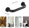 A product image showing a black grab bar with dimensions, and four lifestyle images of its potential placement in a home. Produktbild-Vorschau