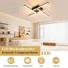 A modern living room with a sleek ceiling light fixture. Produktbild-Vorschau