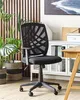 A black office chair is shown in a home office setting with plants and furniture. Náhled obrázku produktu