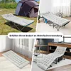 A collage of images showing a camping cot mattress in various settings: outdoors with a tent, indoors in a living room, and in an office setting. Podgląd zdjęcia produktu