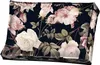 A close-up view of a decorative cushion with a floral pattern. Náhled obrázku produktu