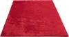 A red rug is shown from a slightly elevated angle against a white background. Produktbild-Vorschau