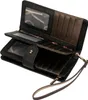 An open black leather wallet with multiple compartments and card slots, displayed against a white background. Produktbild-Vorschau