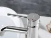 A close-up shot of a chrome faucet with red and blue indicators for hot and cold water. Anteprima dell’immagine prodotto
