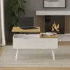 A modern living room with a coffee table in front of a fireplace. Voir les images du produit