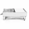 A stainless steel charcoal grill shown from the side, with its legs folded underneath. Produktbild-Vorschau