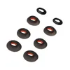 A collection of ear tips for headphones, arranged in a diagonal pattern on a white background. Produktbild-Vorschau