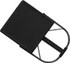 A black foldable laptop table is shown from a top-down perspective against a white background. Náhľad obrázku produktu