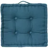 A square teal floor cushion with tufting buttons and a handle on top. Náhled obrázku produktu