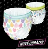 Two pairs of children's pull-up diapers with colorful patterns are displayed against a black background with lightning bolt graphics. Produktbild-Vorschau