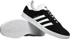A pair of black Adidas Gazelle sneakers with white accents, shown from a slightly elevated angle against a white background. Produktbild-Vorschau