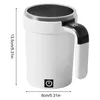 A white self-stirring mug with a digital display on the handle, shown with dimensions indicated. Produktbild-Vorschau