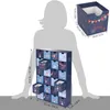 A person's silhouette is shown next to a cardboard advent calendar with 24 drawers, with a separate close-up of one drawer and its dimensions. Náhľad obrázku produktu