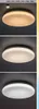 Three images of a round ceiling light, each showing a different color temperature of light. Produktbild-Vorschau
