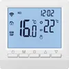 A digital thermostat with a blue LCD screen displaying temperature and time. Náhľad obrázku produktu