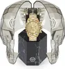 A gold Philipp Plein chronograph watch displayed in a unique skull-shaped presentation case. Podgląd zdjęcia produktu
