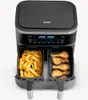 A double air fryer with fries in one compartment and chicken legs in the other. Voir les images du produit