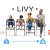 A family is shown sitting on chairs, with the product name 'LIVY' displayed above them. Weight indicators are shown at the bottom. Podgląd zdjęcia produktu