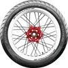 A close-up studio shot of a motorcycle tire and wheel assembly. Náhľad obrázku produktu