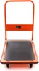 A front view of an orange and black platform trolley on a white background. Náhled obrázku produktu