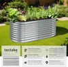 A raised garden bed filled with plants, set in a garden on a sunny day. Náhled obrázku produktu