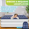 A woman lying on an inflatable mattress in a room. Produktbild-Vorschau