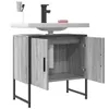 A bathroom vanity with a sink and faucet. Produktbild-Vorschau